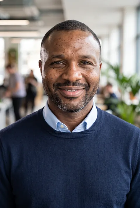 Example AI headshot, Business Casual style (AI-generated person)